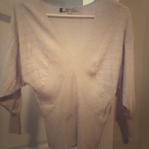 White gold v neck sweater